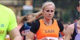 Lady running with orange vest