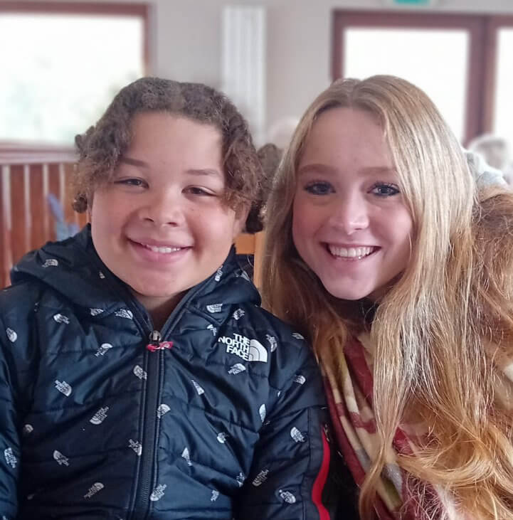 A young boy and girl taking part in a Mentoring Plus activity