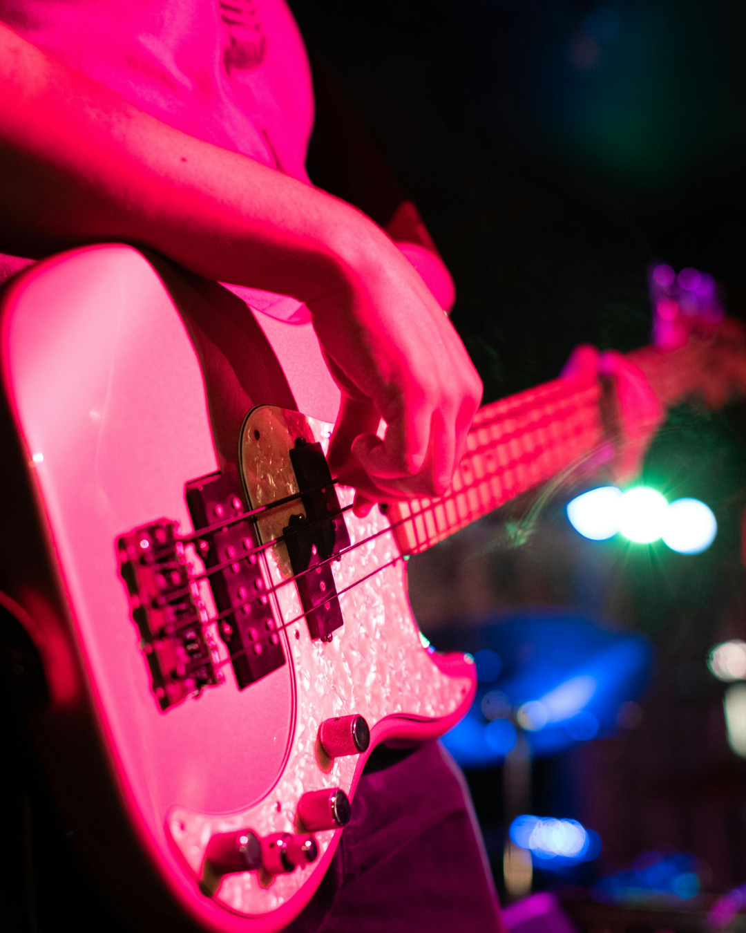 Close up shot of someone playing the guitar