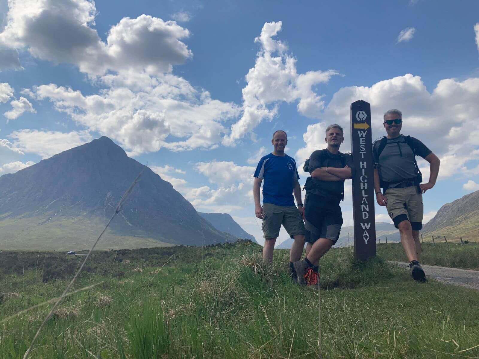 Three men on a fundraising trek along the West Highland Way in support of Mentoring Plus